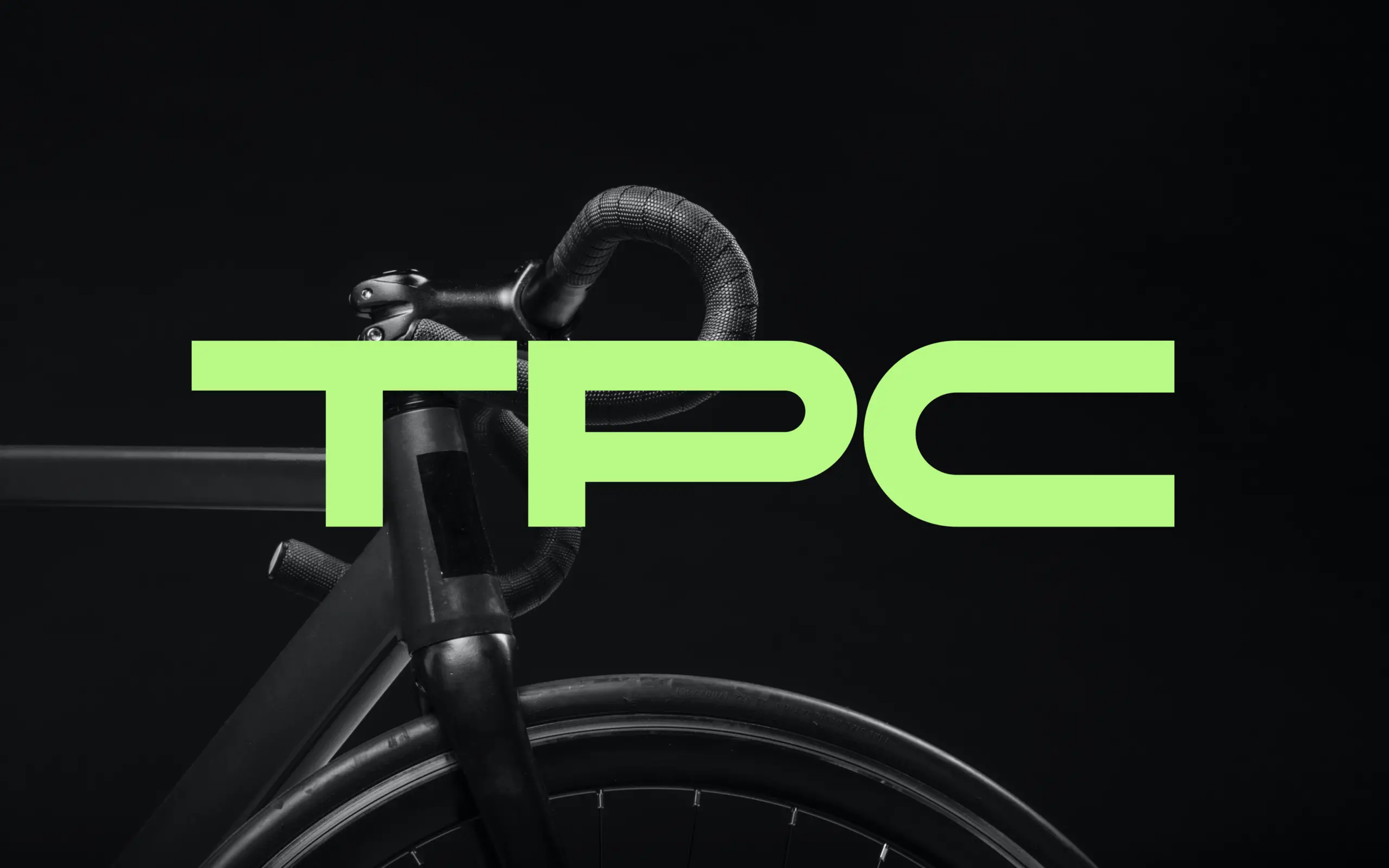 TPC logo on a dark background