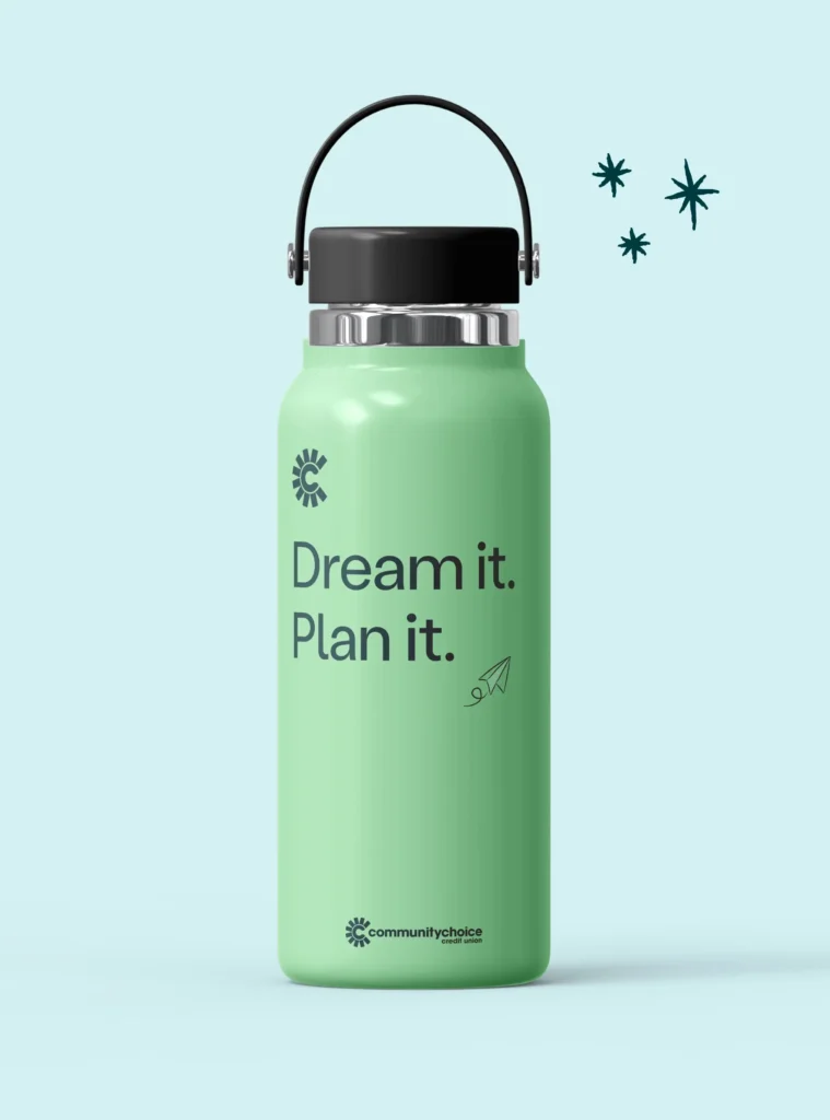 A green water bottle with the text “Dream it. Plan it.” and a small paper airplane drawing, set against a light blue background with a few star illustrations.